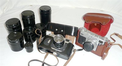 Lot 1136 - Two Russian Cameras - Zorki-4 no.70009631, in a stitched leather case and Kiev no.7403692, in a...