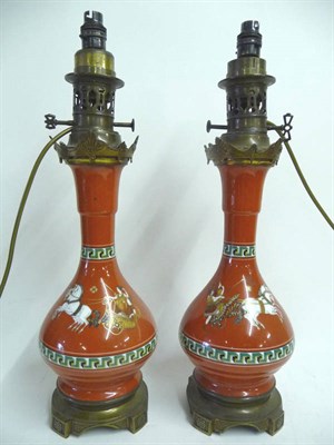 Lot 1200 - A Pair of Gilt Brass Mounted Porcelain Neo-Classical Lamps, probably French, circa 1840-50, of...