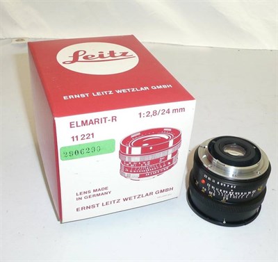 Lot 1139 - A Boxed Leica Elmarit-R f2.8/24mm Lens No.2906290, in black, with bayonet mount, lens hood,...