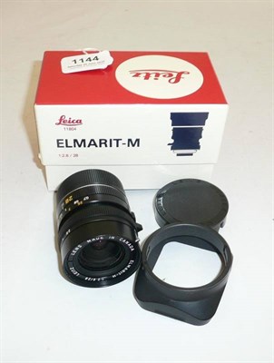 Lot 1144 - A Boxed Leica Elmarit-M f2.8/28mm Lens No.11804, in black, with bayonet mount, lens hood and...