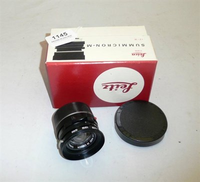 Lot 1145 - A Boxed Leica Summicron-M f2/35mm Lens No.11310, in black, with bayonet mount, passport and...