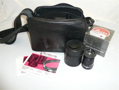 Lot 1147 - A Leica Elmar-C f4/90mm Lens No.2604292, in black, with bayonet mount, in leather zip case; A Boxed