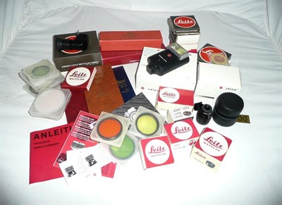 Lot 1148 - A Large Collection of Boxed Leica Camera Accessories, including filters, filter holders, lens caps