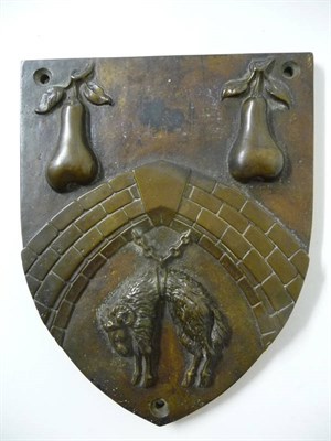 Lot 1202 - A Bronze Armorial Plaque, 18th/19th century, of shield shape, cast in high relief with two...