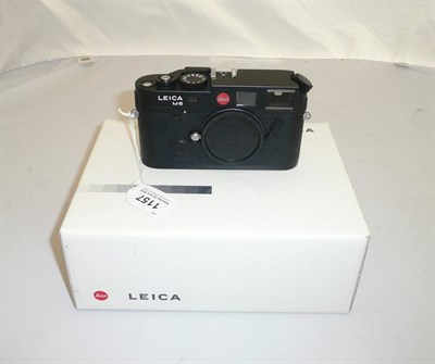 Lot 1157 - A Leica M6 TTL Camera Body No.2469182, in black, with passport, manual, hard plastic case and...