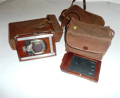 Lot 1160 - A Shew & Co. Mahogany and Alumunium Xit Folding Plate Camera, circa 1900, with Unicum shutter...