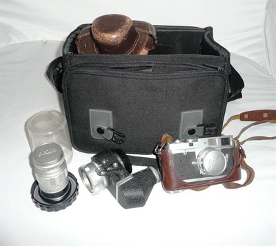 Lot 1161 - A Leica M2 Camera No.971131, circa 1959, with brushed chrome finish, button rewind, Elmar f/2.8 5cm