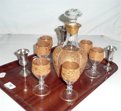 Lot 19 - A Paden (American) decanter set and three white metal communion cups
