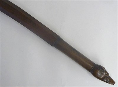 Lot 1207 - A Carved Mahogany Tiller Handle, 19th century, the cylindrical handle with greyhound head...