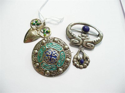 Lot 47 - An Art Nouveau enamelled pendant, a Continental brooch with pendant drop and a Celtic-style...