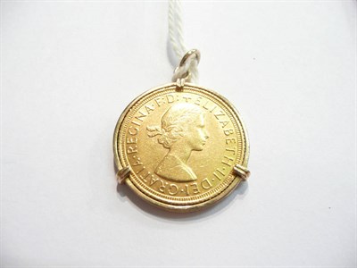 Lot 54 - Gold sovereign in mount, 1958