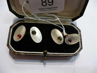 Lot 89 - A pair of mother-of-pearl and stone-set cuff-links