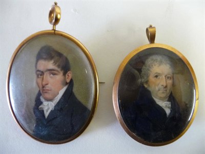 Lot 1244 - English School, circa 1810: Miniature Portrait of a Gentleman, with grey hair, blue eyes and...