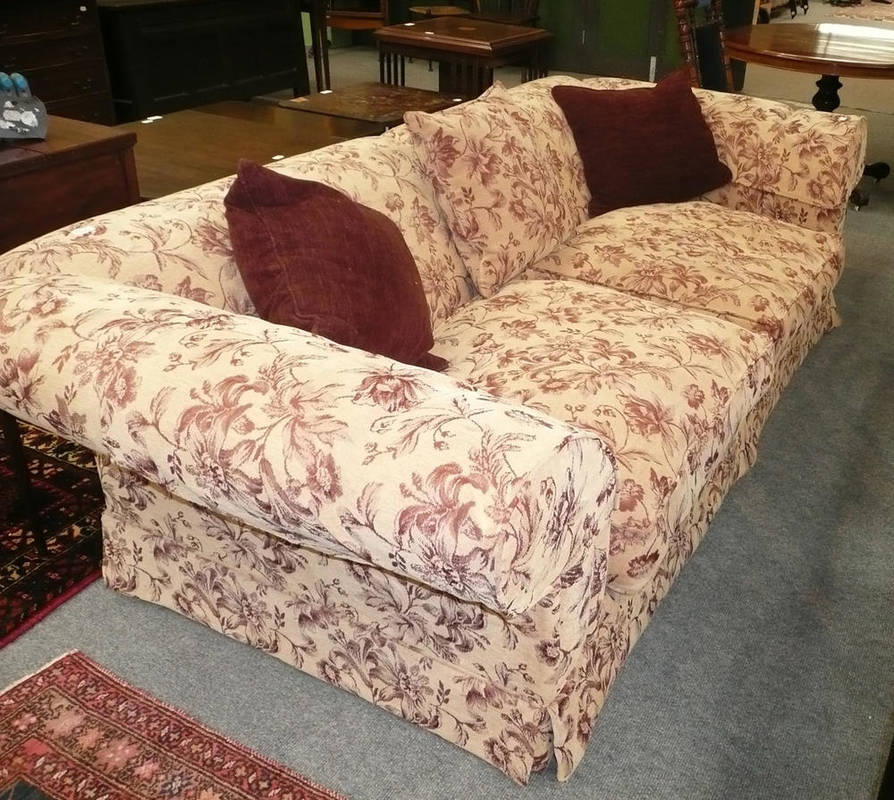 Lot 553 - Patterned three piece suite by Peter Guild