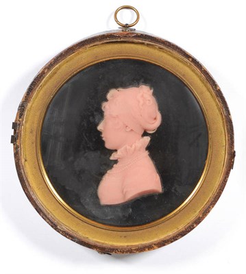 Lot 1265 - Peter Rouw: Wax Profile Bust Portrait of a Young Woman, 1810, finely modelled in light salmon...