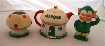 Lot 8 - A Shelley Mabel Lucie Attwell Boo Boo's three piece tea set, comprising teapot and cover, milk...