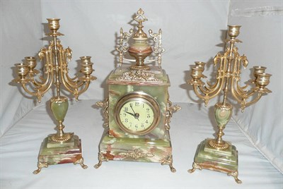 Lot 15 - Three piece gilt clock set