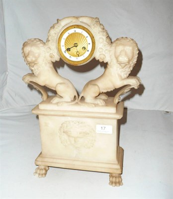 Lot 17 - An alabaster striking mantel clock (a.f.)