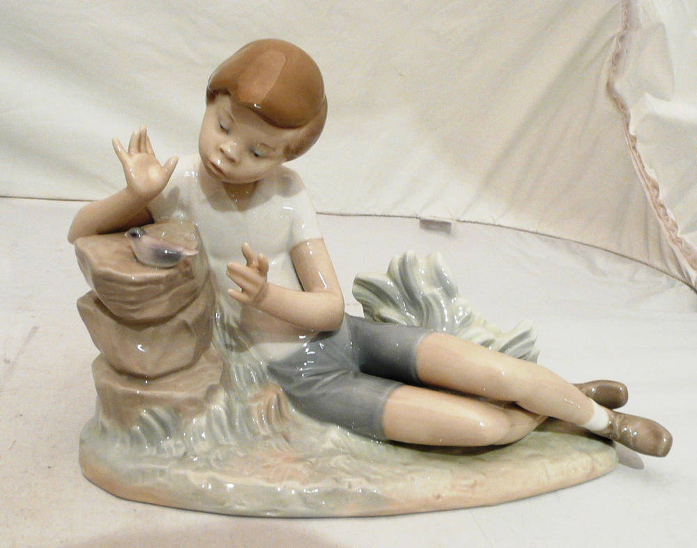 Lot 18 - Lladro figure of a young boy