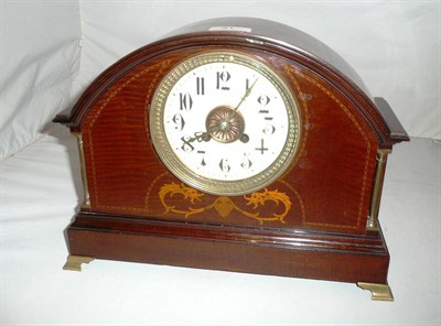 Lot 31 - An inlaid striking mantel clock