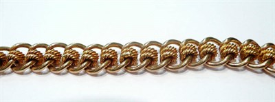 Lot 65 - A fancy link curb and lock bracelet