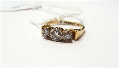 Lot 88 - An 18ct gold diamond three stone ring