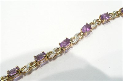 Lot 97 - A 9ct gold amethyst and diamond bracelet