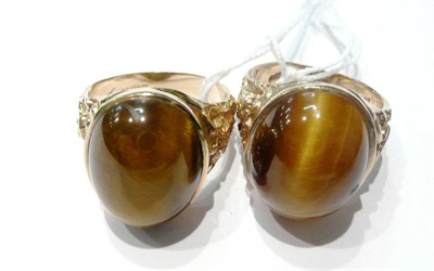 Lot 104 - Two 9ct gold tigers eye set signet rings