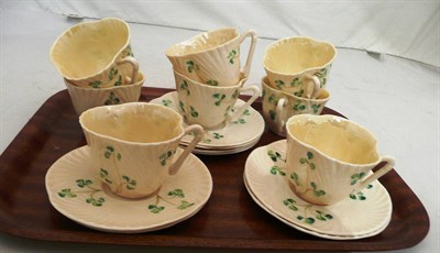 Lot 139 - Belleek eight piece shamrock decorated teaset