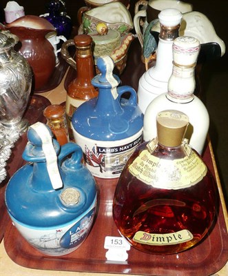 Lot 153 - Two pottery flagons of 'Lambs Rum', a dimple whisky, three 'Bells' pottery flagons and a...