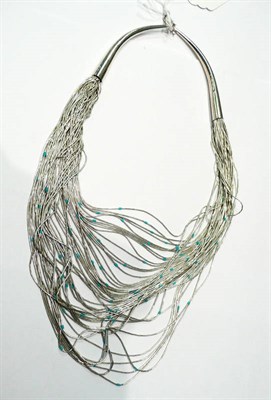 Lot 172 - A turquoise multi strand necklace