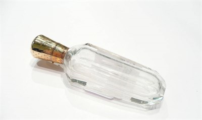 Lot 173 - Cut glass scent bottle and stopper with silver gilt mount