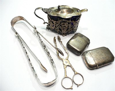 Lot 206 - Pierced silver mustard with blue glass liner and spoon, two silver vesta cases, two silver...