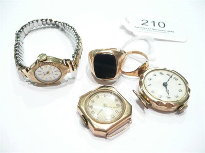 Lot 210 - Four signet rings (one set with onyx) and three watch faces (one with attached expanding strap)