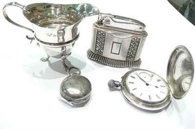 Lot 220 - Silver cream jug, Ronson lighter, coin case and a silver watch