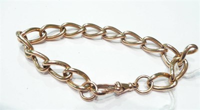 Lot 235 - A curb link bracelet, stamped every link