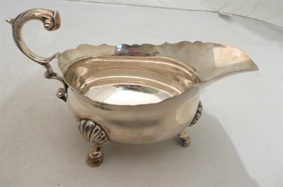 Lot 242 - A George V silver sauce boat