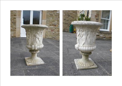 Lot 1302 - A Pair of Cast Composition Stone Campana Garden Urns, late 20th century, each cast with a...