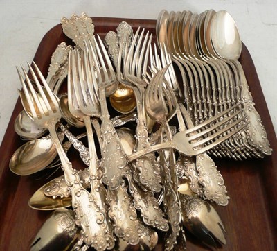 Lot 253 - Suite of American silver comprising twelve forks, twelve spoons, ten teaspoons, seven ice cream...