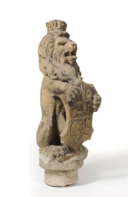 Lot 1305 - A 19th Century Stoneware Royal Lion Finial, the crowned noble beast holding the Royal shield to his