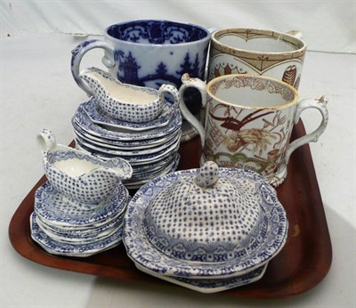 Lot 283 - Child's blue and white miniature dinner service and three pottery mugs