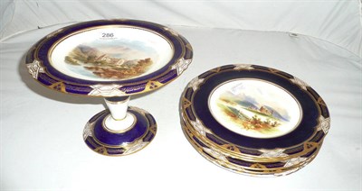 Lot 286 - Blue and gilt dessert service decorated with scenes