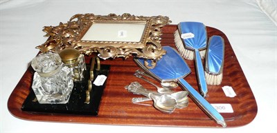 Lot 306 - Two cast frames, inkwell, silver and enamel three piece dressing table set, silver spoons etc