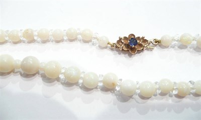 Lot 310 - An opal graduated bead necklace