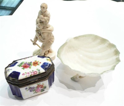 Lot 330 - A Belleek shell salt, a Continental snuff box and a Japanese ivory okimono of a boy and child circa