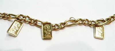 Lot 351 - A figaro link bracelet hung with rose panels, stamped '750'