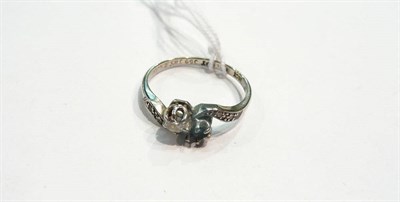 Lot 364 - A diamond twist ring (one stone missing)