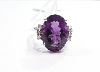 Lot 366 - A 14ct white gold amethyst and diamond ring