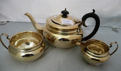 Lot 380 - Silver three piece tea service