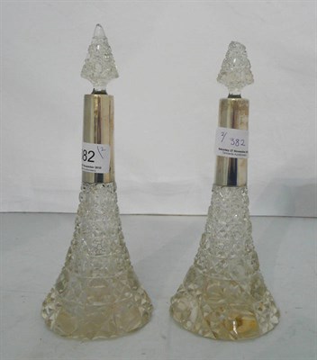 Lot 382 - Pair of silver-collared cut glass scents